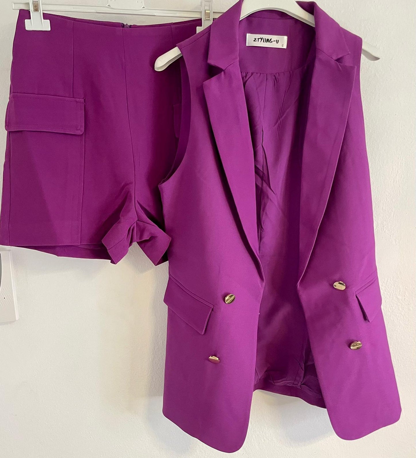 Purple vest. Short sold separately